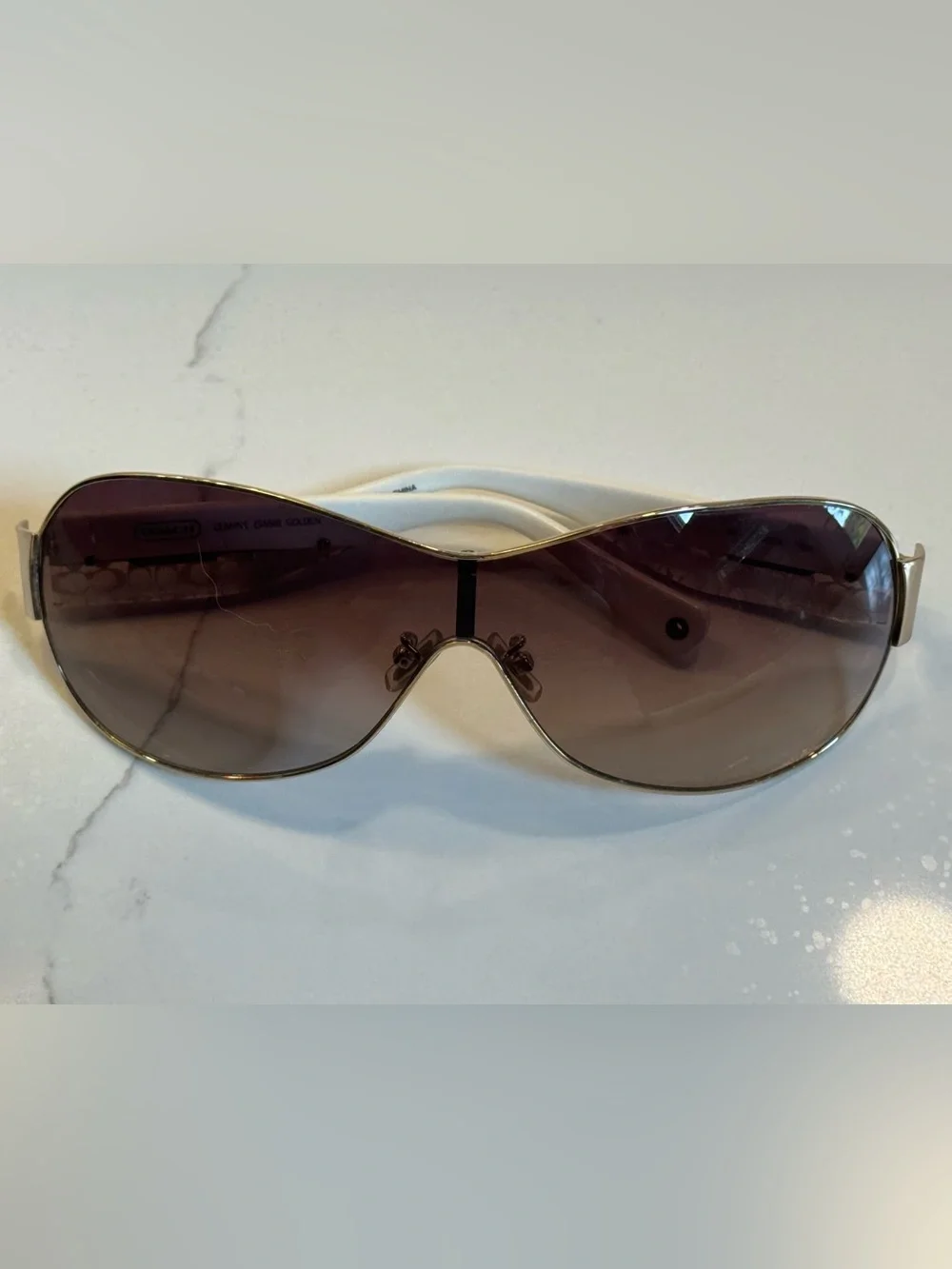 Women’s Coach Leanne S566 wrap golden sunglasses. White with signature C